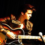 273764_Papel-de-Parede-Elvis-Presley-tocando-Violao_1920x1200